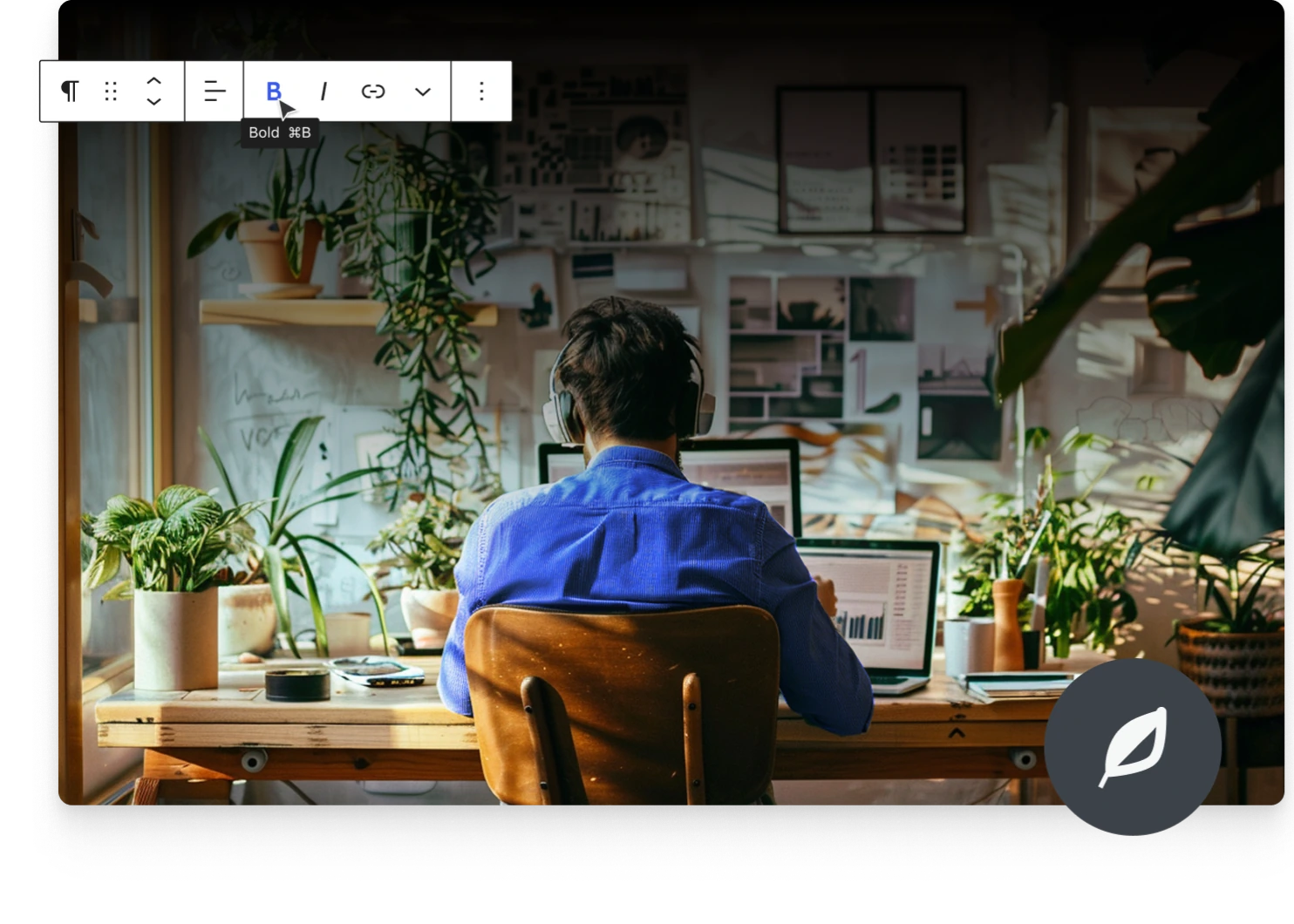 Man sitting at his desk writing a blog post.