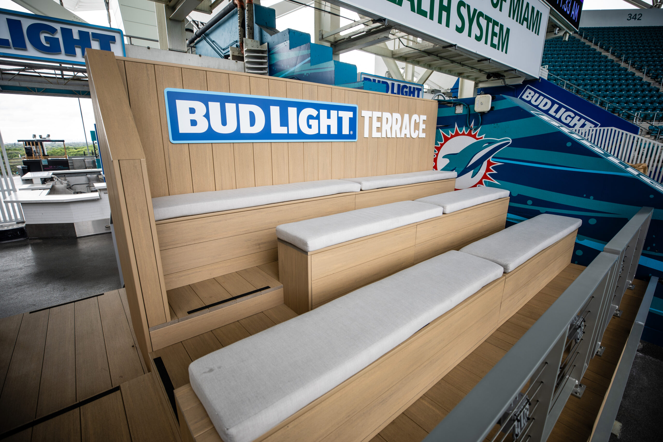 Terrace Suite Spectators enjoy food and beverage from a Bodega suite at a Dolphins game.